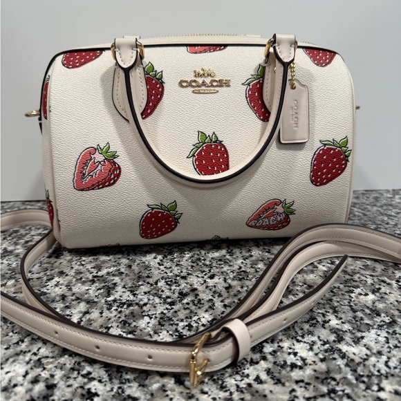 Coach Handbags - Coach Rowan Satchel Bag
Crossbody With Strawberry Print Canvas Chalk